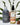 Warm Earth Luminous Set – White Sage Body wash and Desert Cedar body oil displayed with natural bark and greenery